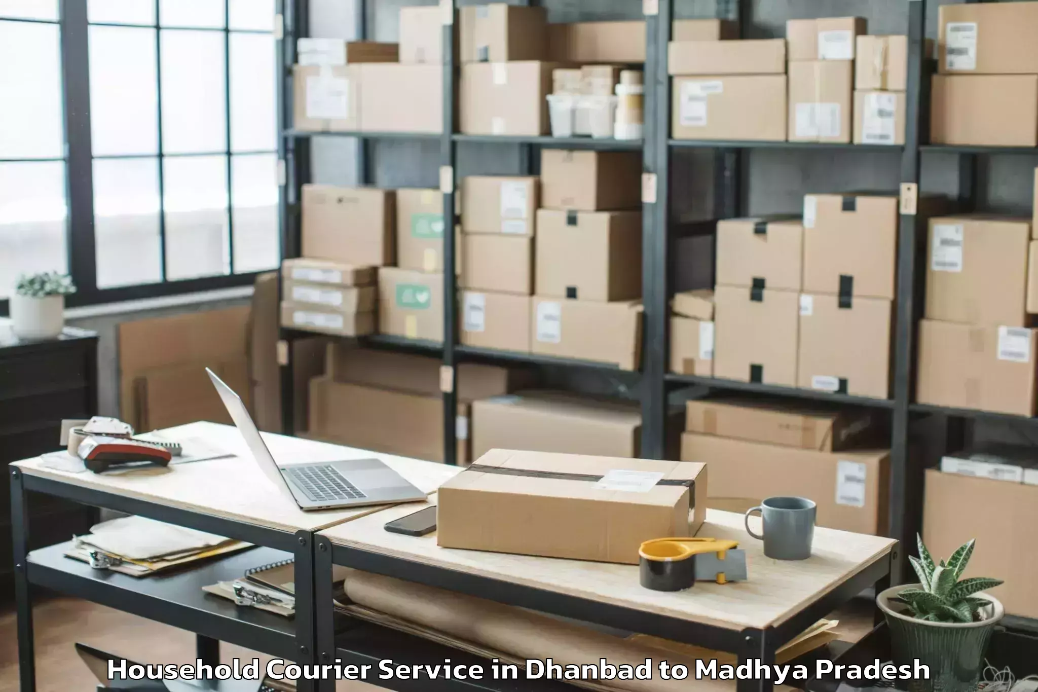 Get Dhanbad to Ghugri Household Courier